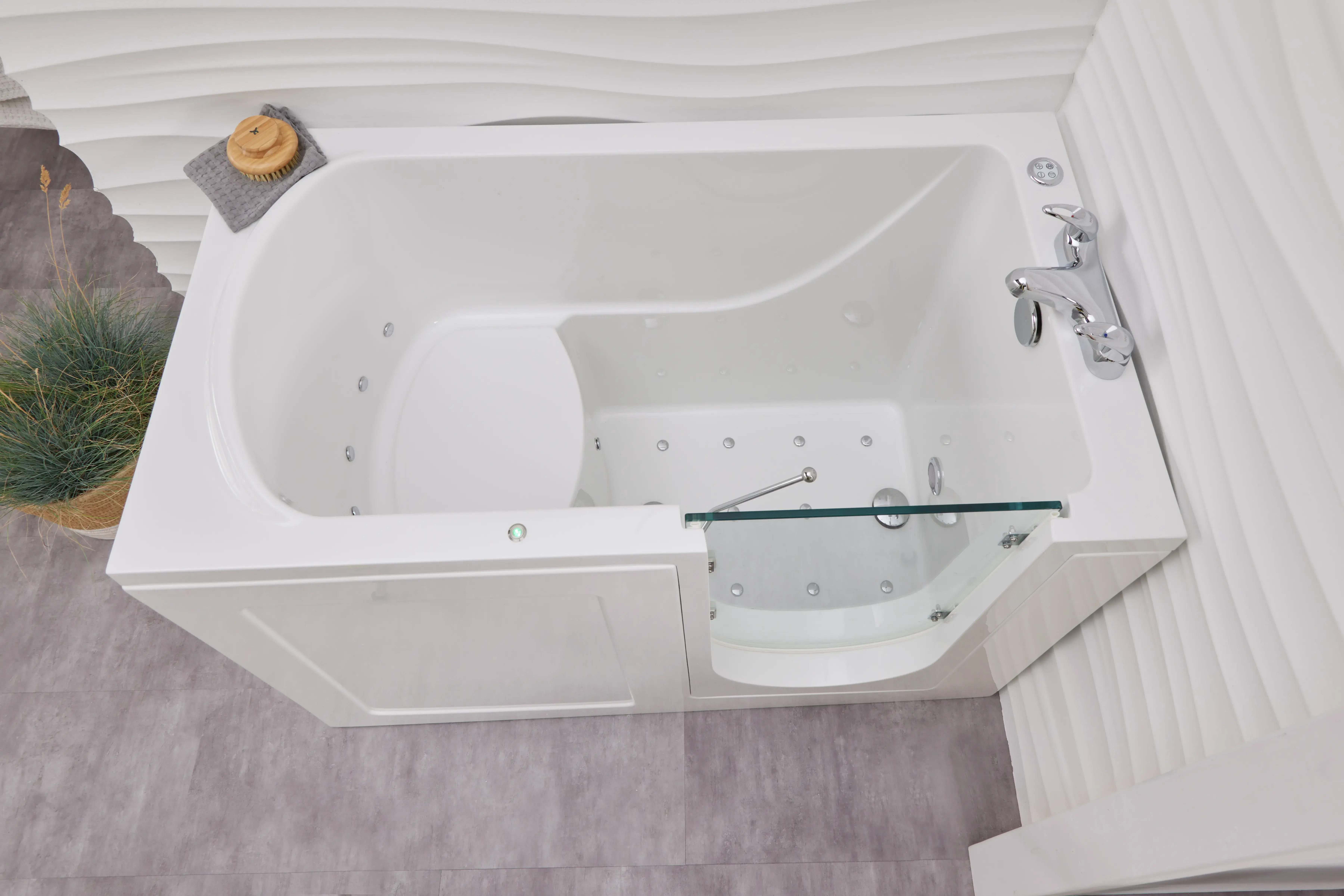 A white bath tub sitting inside of a bathroom.