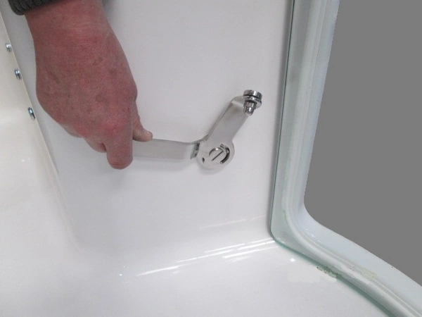 a person is using a wrench to fix a sink
