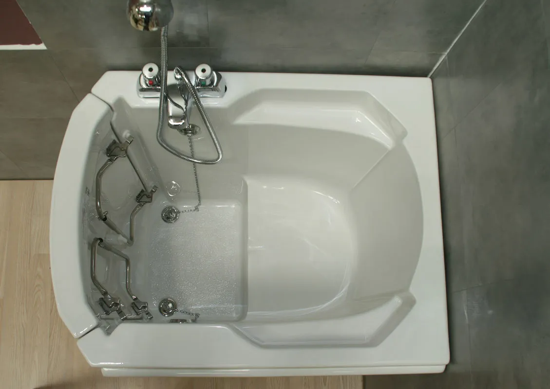 a white bath tub sitting on top of a wooden floor