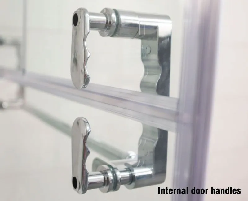 a close up of two metal handles on a glass door